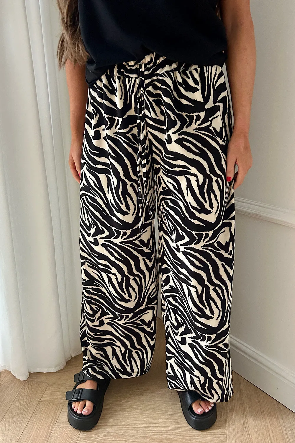Shannon Black Zebra Print Flared Trousers